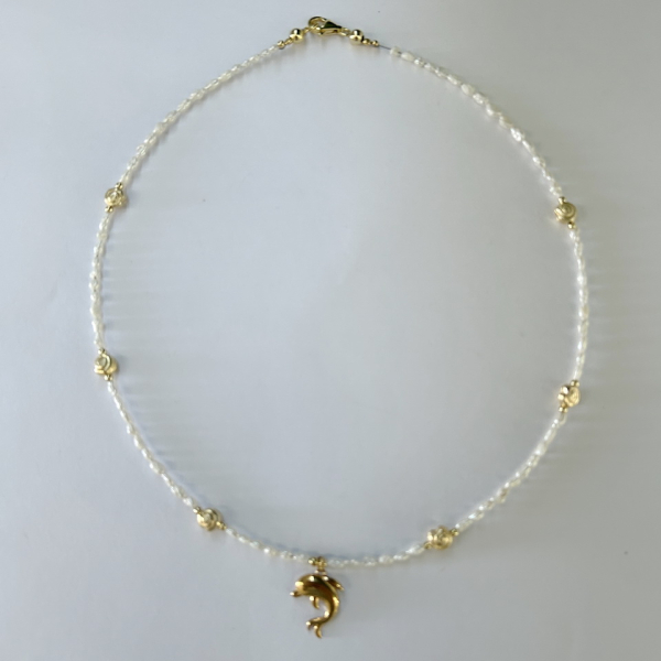 Collier Perle, Charms