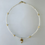 Collier Perle, Charms